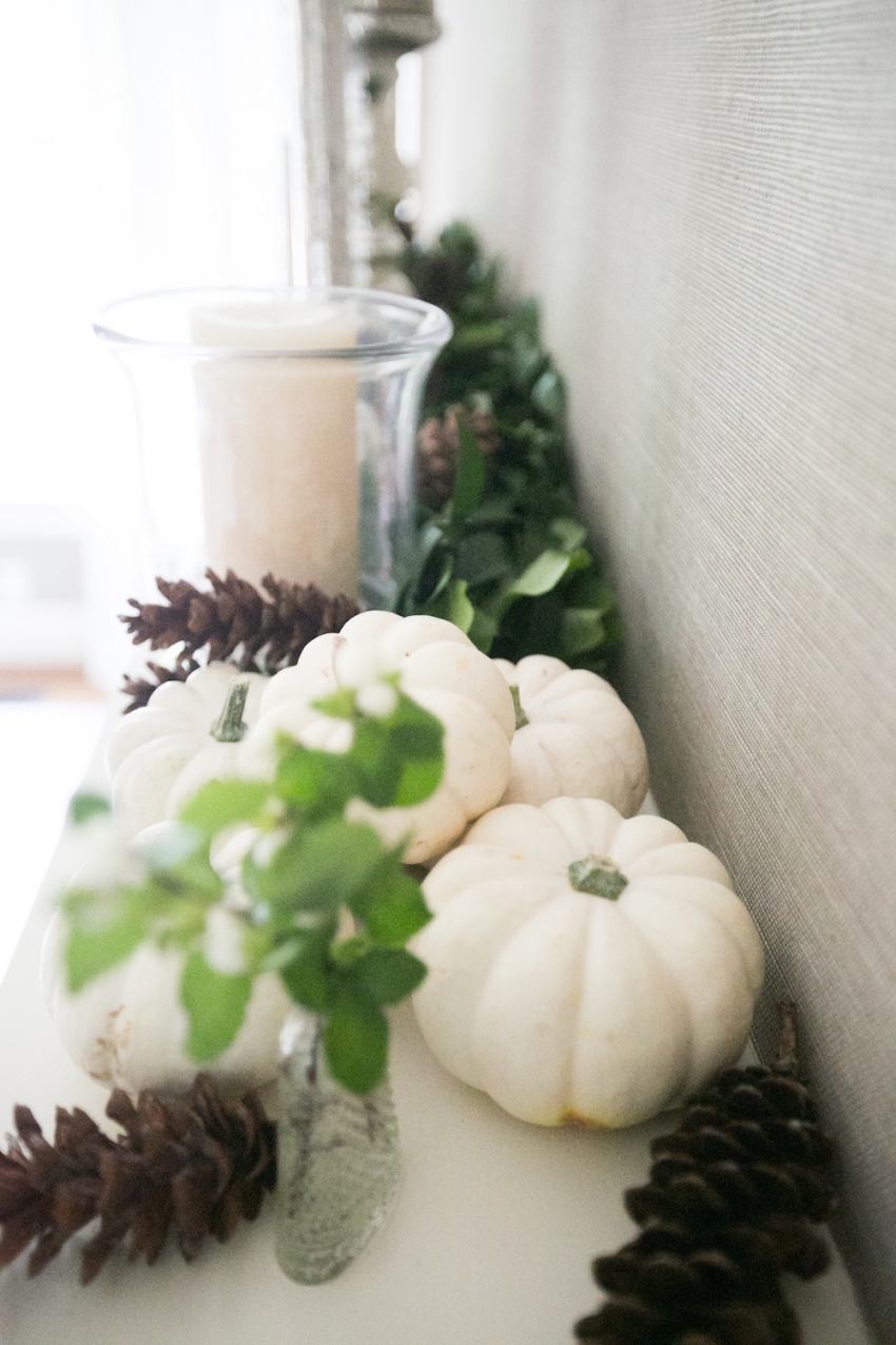Fireplace mantel and white pumpkins by Fashionable Hostess
