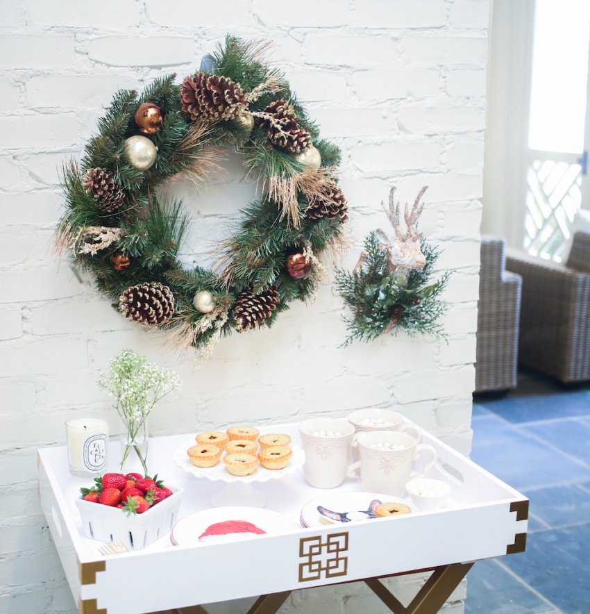 Holiday with Pier 1 featuring Pier 1 Mugs, Puppy Plates, Wreath, Deer Head Decor, and Cake Plate on Fashionable Hostess