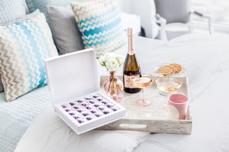 Classsic Easter Hostess Gifts, Santa Margherita Prosecco, Maggie Louise Confections Easter Chocolates, Laduree Pink Candles
