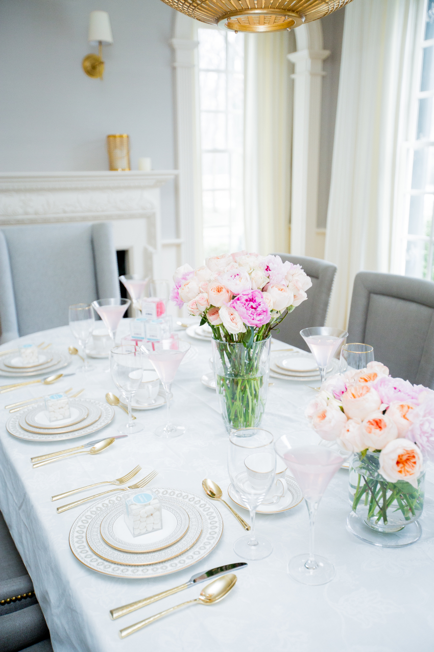 Pink floral arrangements of peonies, juliet roses and spray roses on FashionableHostess