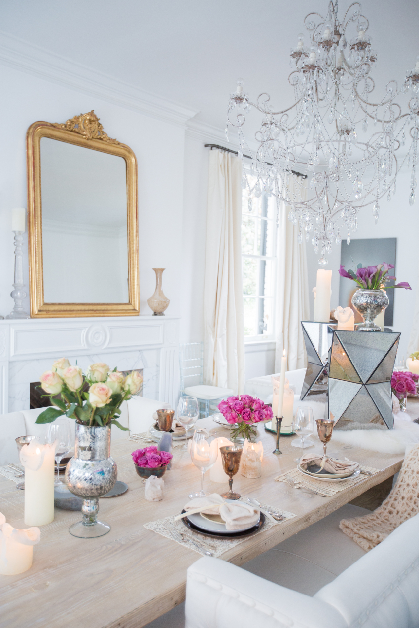 Stunning gold mirror above the fireplace in the Home of Cassie Kelley