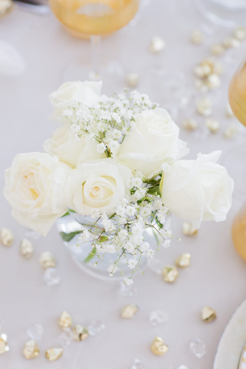 host-a-new-years-dinner-party-with-white-flower-arrangements-by-fashionable-hostess